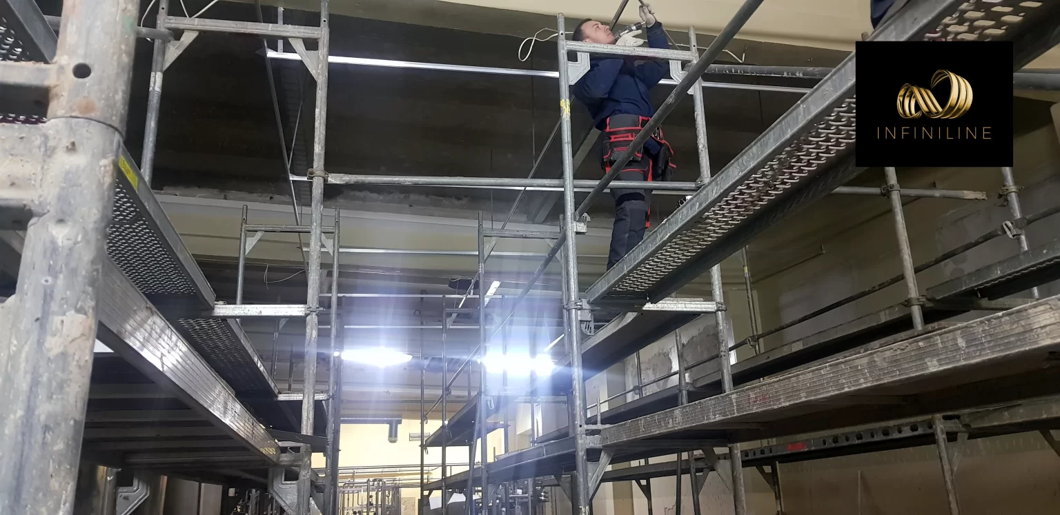 wykonane-prace-sufity-napinane-do-pomieszczen-produkcyjnych-fabryka-logo-8